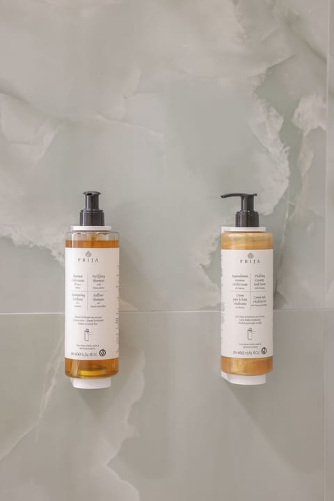 Deluxe Double Room, Balcony, City View | Bathroom | Shower, free toiletries, hair dryer, bathrobes