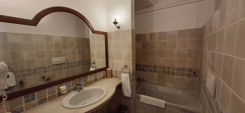 Classic Double or Twin Room | Bathroom | Hair dryer, towels, soap, shampoo