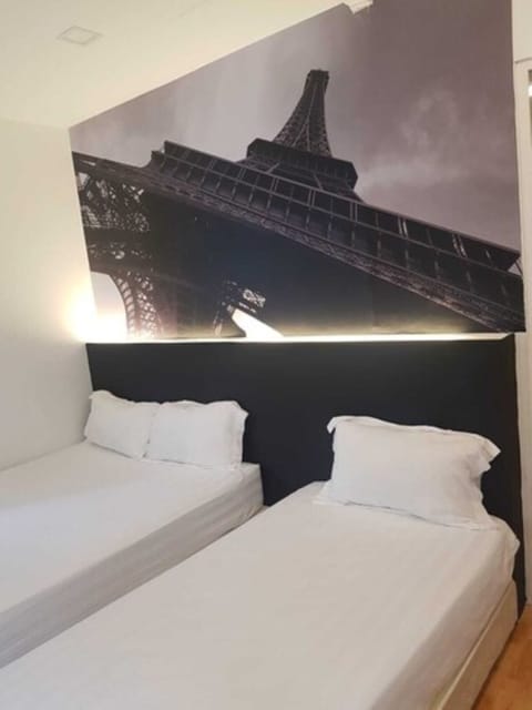 Triple Room | Iron/ironing board (on request), WiFi (free), bed sheets