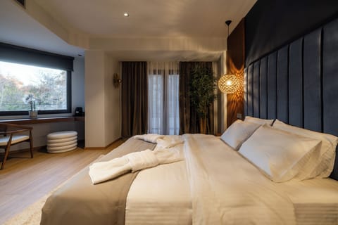 Basic Studio Suite, Balcony, City View | Individually decorated, blackout drapes, soundproofing