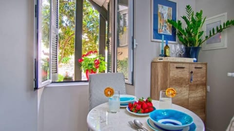 Apartment, Courtyard View | Living area | 32-inch Smart TV with digital channels