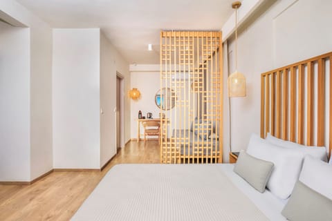 Junior Studio Suite, Garden View | In-room safe, soundproofing, iron/ironing board, free WiFi