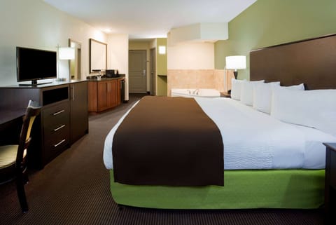 Studio Suite, 1 King Bed, Non Smoking | Desk, laptop workspace, blackout drapes, iron/ironing board