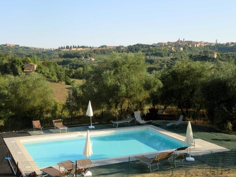 Outdoor pool, open 9:00 AM to 8:00 PM, pool umbrellas, sun loungers