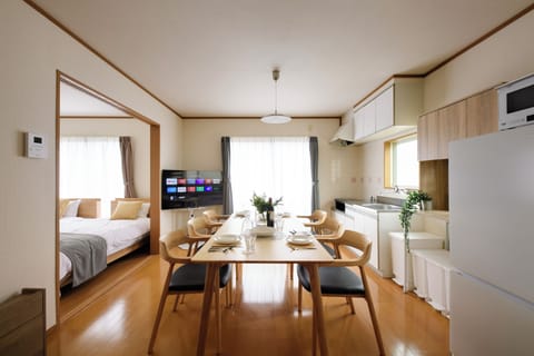 Standard Apartment, Balcony, City View | In-room dining