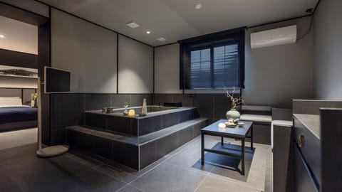 Signature Spa & Sauna | Premium bedding, individually decorated, blackout drapes, soundproofing