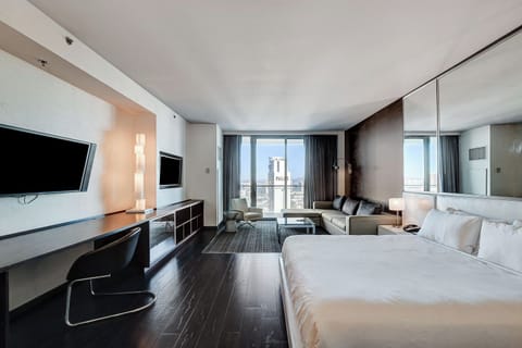 Deluxe Studio Suite, City View | Premium bedding, in-room safe, desk, laptop workspace