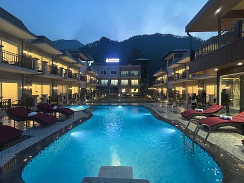 Outdoor pool, open 10:00 AM to 7:00 PM, sun loungers