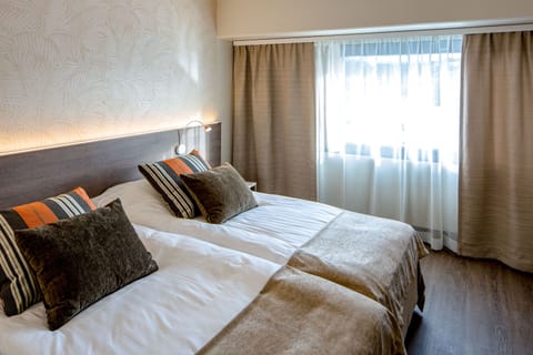 Standard Twin Room | Desk, blackout drapes, iron/ironing board, free WiFi