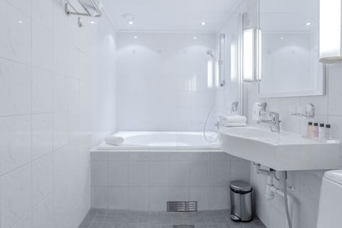 Superior King Room with Bath(Family use, 2 adults + 2 children) | Bathroom | Hair dryer, heated floors, towels, soap