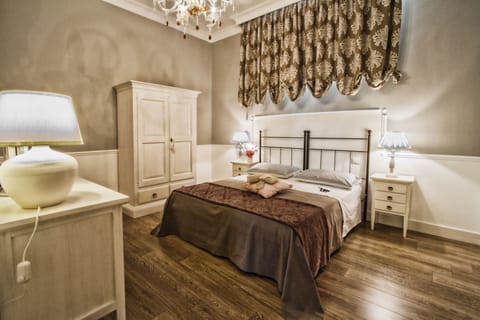 Deluxe Triple Room | Private kitchen | Highchair