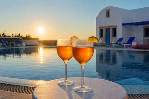 Seasonal outdoor pool, open 11:00 AM to 7:00 PM, pool umbrellas