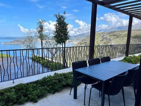 Premium Apartment, Sea View | Living area | 42-inch LED TV with satellite channels