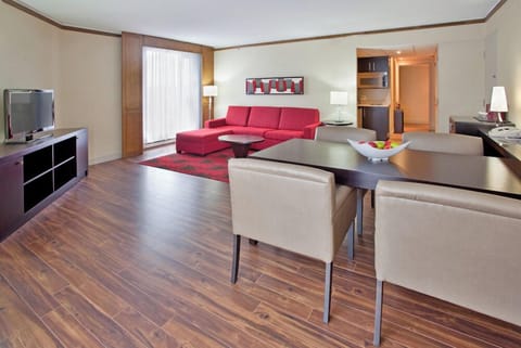 Executive Suite, 1 Bedroom, Non Smoking | Living area | 32-inch flat-screen TV with cable channels, TV, iPod dock