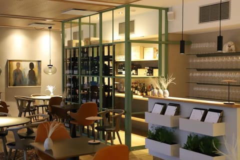 Breakfast, lunch, dinner served; garden views