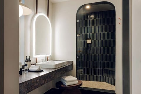 Combined shower/tub, hair dryer, bathrobes, towels