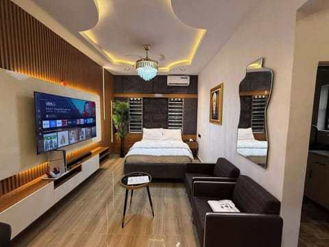 Family Room, Balcony, City View | Desk, laptop workspace, blackout drapes, soundproofing
