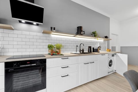 Apartment, City View | Private kitchen | Espresso maker, coffee/tea maker, electric kettle, highchair