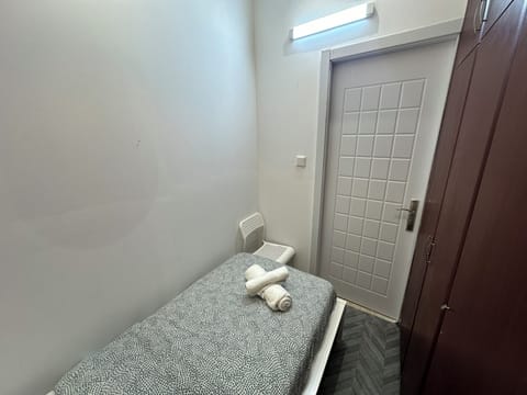 Economy Single Room, Balcony, City View | Iron/ironing board, free WiFi