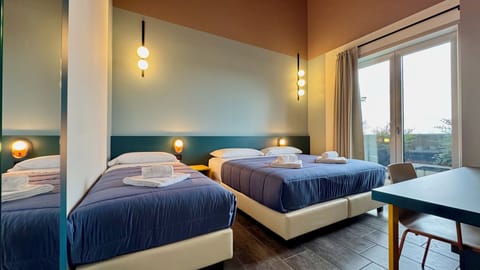 Superior Triple Room, Balcony | In-room safe, desk, blackout drapes, soundproofing