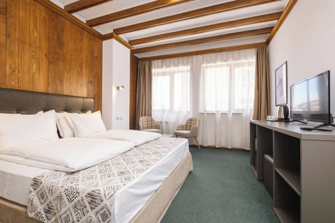 Double Room, City View | Desk, iron/ironing board, free WiFi