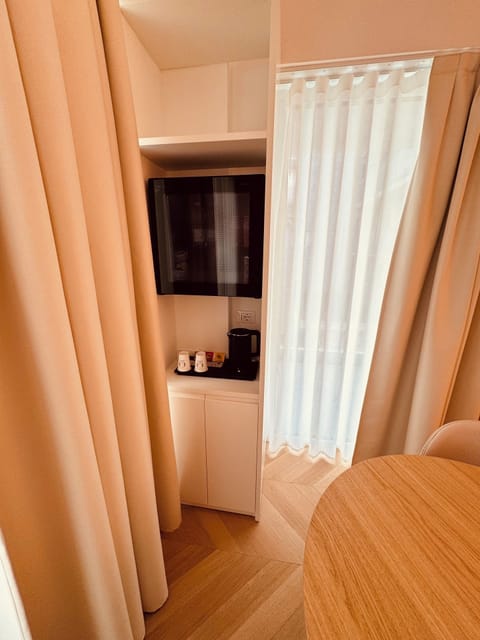 Junior Double or Twin Room, Non Smoking, Sea View | Minibar