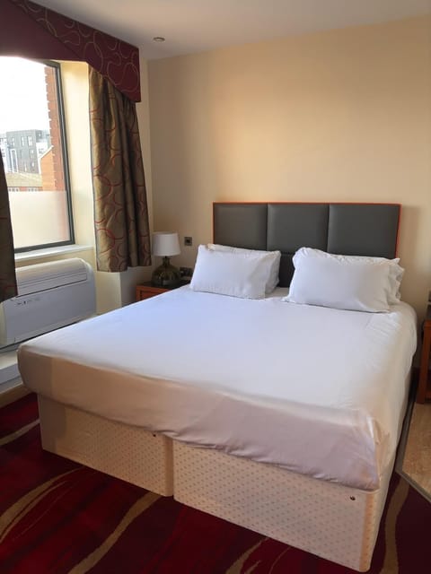 Double or Twin Room, City View | In-room safe, desk, laptop workspace, soundproofing