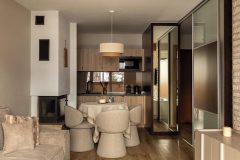 Deluxe Apartment, Balcony | Living area | Flat-screen TV