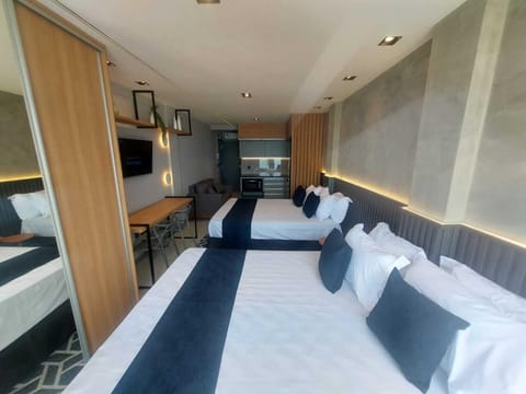 Deluxe Quadruple Room, Sea View | In-room safe, desk, laptop workspace, free WiFi