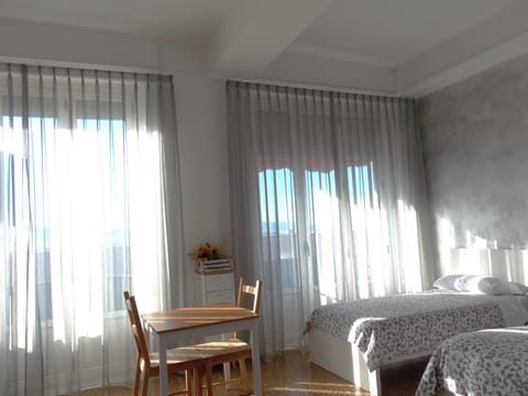 Deluxe Triple Room, Balcony, Sea View | Soundproofing, free WiFi