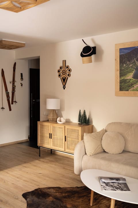 Deluxe Apartment | Living area | 50-inch flat-screen TV with cable channels, TV