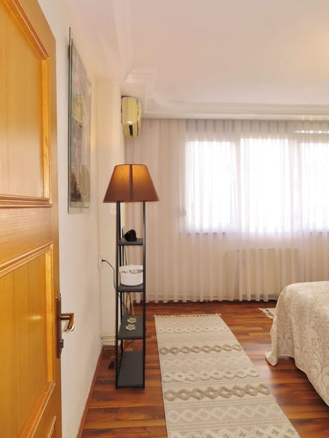 Apartment, 1 Bedroom, Balcony, Courtyard View | Blackout drapes, iron/ironing board, free WiFi