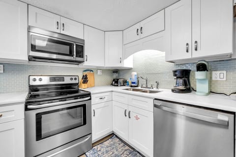Condo, Multiple Beds (Pinnacle Port A-929) | Private kitchen | Oven, toaster, cookware/dishes/utensils