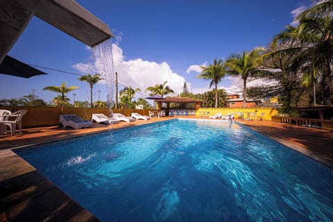Outdoor pool, open 10:00 AM to 9:00 PM, pool umbrellas, sun loungers