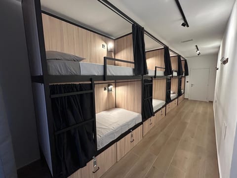 Comfort Shared Dormitory, Mixed Dorm, Shared Bathroom (Room C) | Laptop workspace, blackout drapes, iron/ironing board, free WiFi