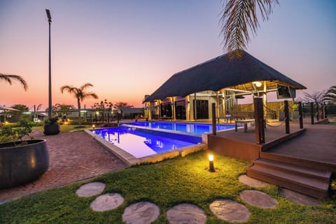 Outdoor pool, open 8:00 AM to 7:00 PM, pool umbrellas, sun loungers
