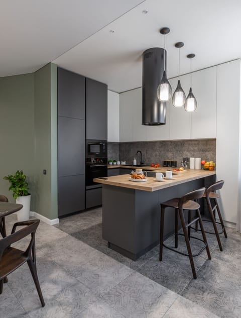 Luxury Apartment, Balcony, City View | Private kitchen | Electric kettle, cleaning supplies