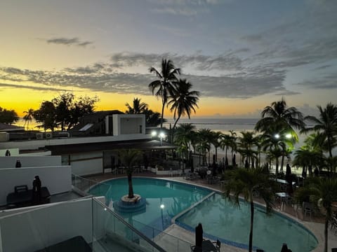Outdoor pool, open 7:00 AM to 9:00 PM, pool umbrellas, sun loungers