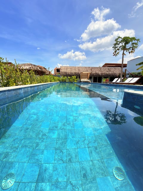 Outdoor pool, open 8:00 AM to 8:00 PM, pool umbrellas, sun loungers