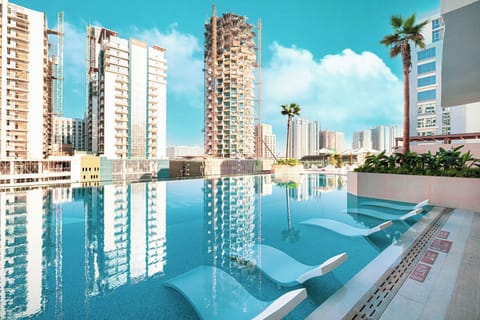 Indoor pool, outdoor pool, open 9:00 AM to 9:00 PM, pool umbrellas