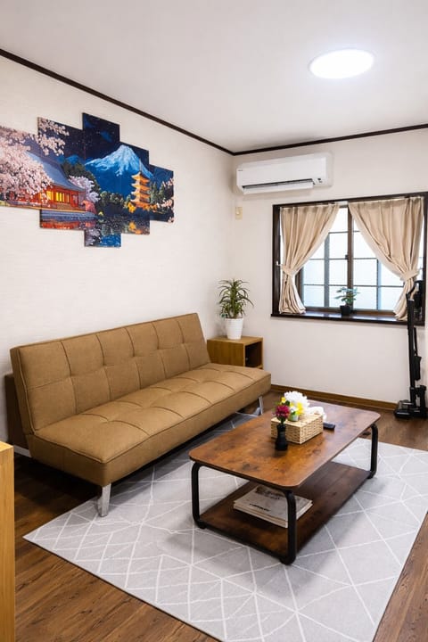 Deluxe House, Balcony | Living area