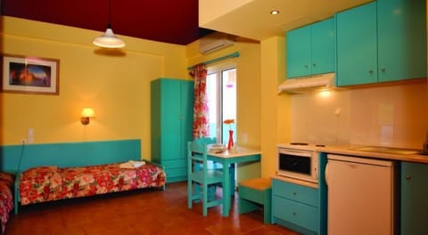 Apartment, 1 Bedroom | Living area | Flat-screen TV