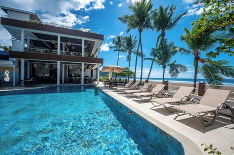 Outdoor pool, open 8:00 AM to 11:00 PM, free cabanas, pool umbrellas