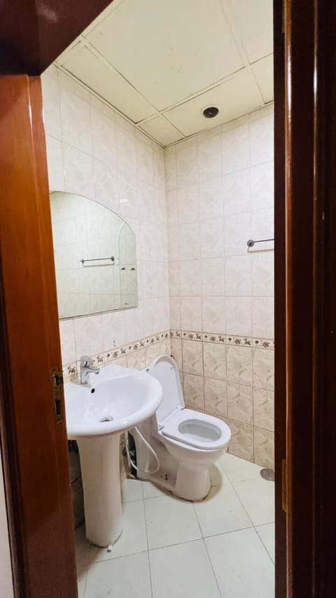 Economy Double Room, Balcony, City View | Bathroom | Combined shower/tub, towels, toilet paper