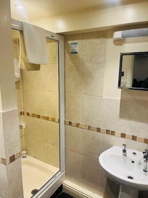 Standard Double Room | Bathroom | Combined shower/tub, hair dryer, towels, soap