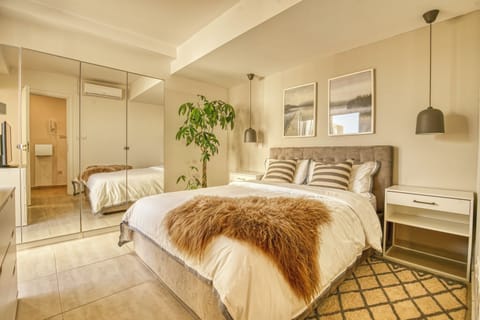 Apartment, City View | Blackout drapes, iron/ironing board, free WiFi