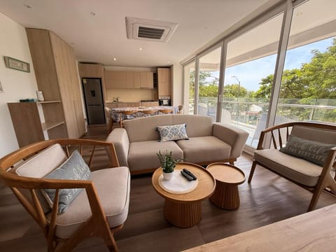 Deluxe Apartment, Balcony | Living area | Flat-screen TV