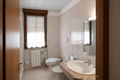 Shower, towels, toilet paper