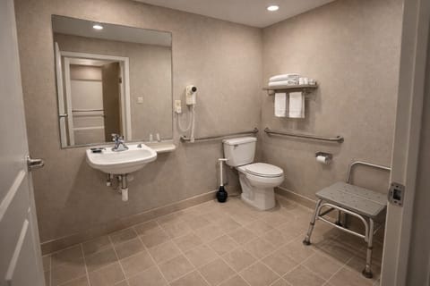 Combined shower/tub, hair dryer, towels, soap