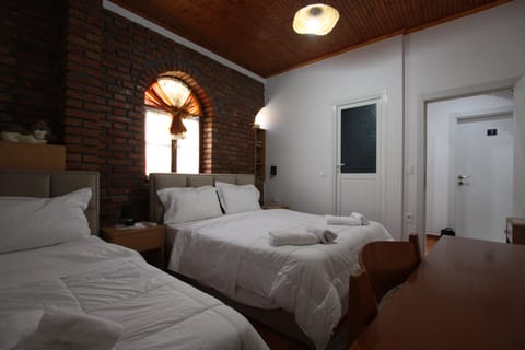 Standard Triple Room | Blackout drapes, soundproofing, iron/ironing board (on request)